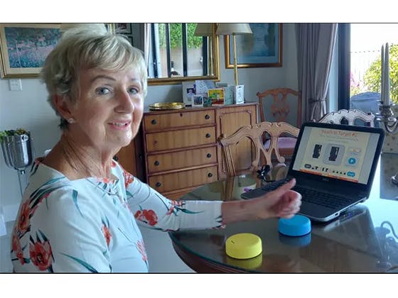stroke survivor using FitMi at home for daily therapy