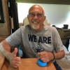 stroke survivor using the fitmi home rehab device at his house to get additional therapy