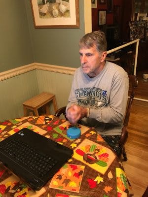 stroke survivor using FitMi to recover from paralysis at home