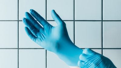 gloves for digital stimulation to promote bowel movements
