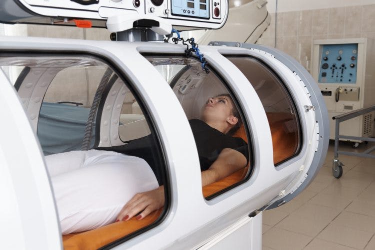 patient undergoing hyperbaric oxygen therapy for brain injury