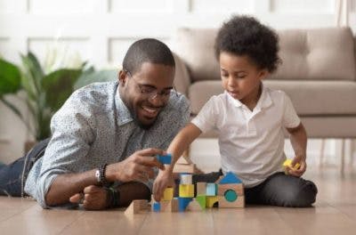 child with cerebral palsy playing with toys