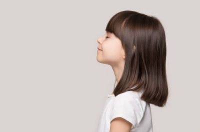 child practicing yoga for cerebral palsy