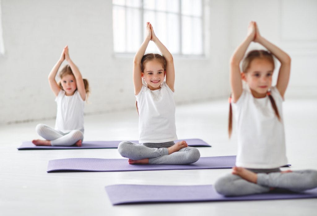 children trying yoga for cerebral palsy