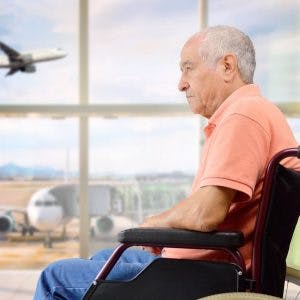 man waiting in airport terminal flying after stroke