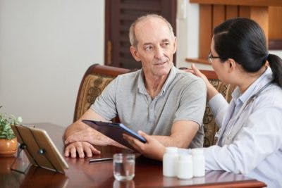 Doctor telling patient about lack of insight after brain injury