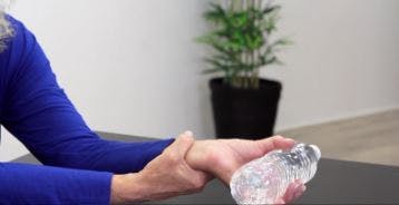 physical therapist showing stroke recovery exercises