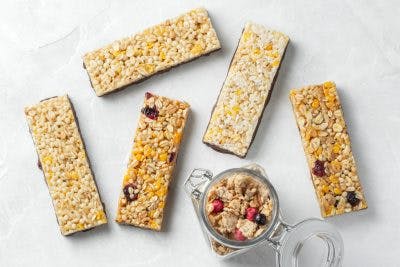 top down view of granola bars on white background, a great snack for weight loss after brain injury