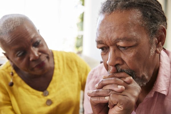 Senior woman comforting husband who has hippocampus brain injury