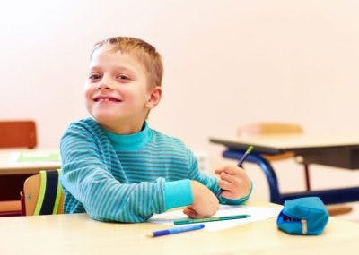 young boy with cerebral palsy at occupational therapy