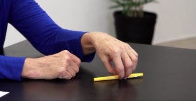 therapist spinning a pen on a table