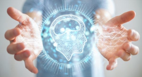 person holding holographic image of right hemisphere brain damage
