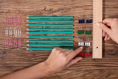 Person Arranging The Clips and Pencils With Scale Because They Have OCD