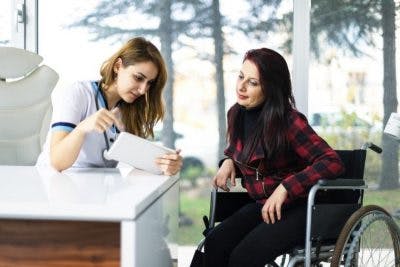 doctor explaining spinal shock to severe sci patient