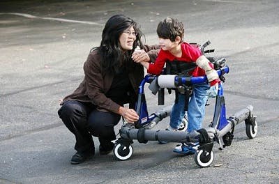 kid with cerebral palsy trying to prevent osteoporosis