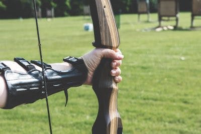 person with cerebral palsy practicing archery