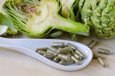 dish with natural vitamins for stroke recovery with artichokes in background