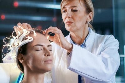 doctor applying magnetic therapy to stroke patient 