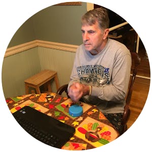 Ron, a stroke survivor, using FitMi home therapy to recover his paralyzed arm