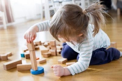 little girl with cerebral palsy w-sitting