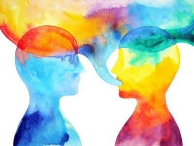 watercolor drawing of two people speaking, with the colors bleeding together to represent conduction aphasia