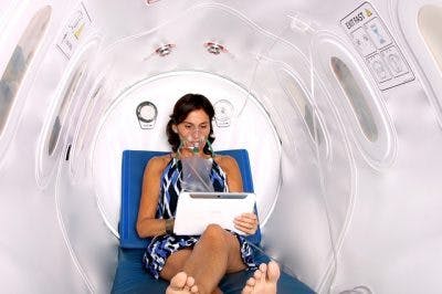 woman with spinal cord injury at hyperbaric oxygen therapy