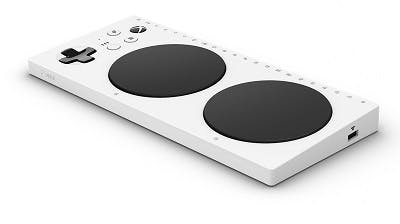 https://cdn.flintrehab.com/uploads/2021/01/xbox-adaptive-controller-gift-for-people-with-cerebral-palsy.jpg