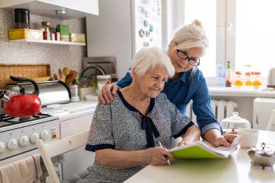 caregiver and stroke survivor discussing stroke recovery tips