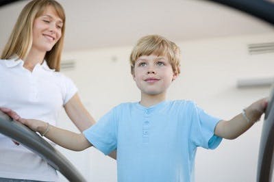 kid with cerebral palsy at physical therapy to improve walking