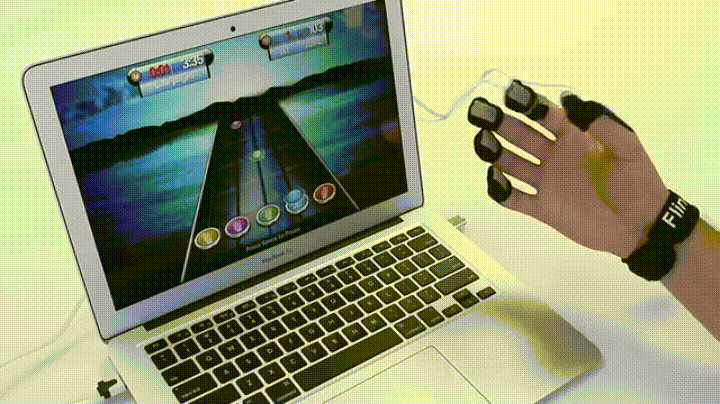 user demonstrating how to use MusicGlove hand therapy in sync with the music