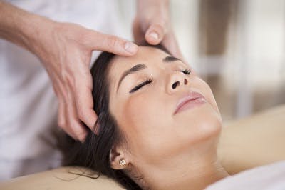 woman with traumatic brain injury participating in craniosacral therapy