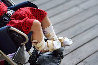 child wearing ankle foot orthotics