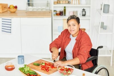 brain injury survivors practicing occupational therapy adaptive technique