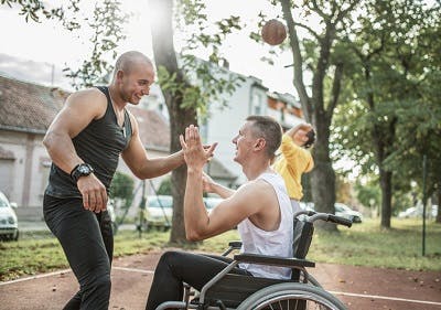 men participating in adaptive sports with brain injury patients