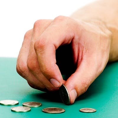 hand therapy exercise for spinal cord injury using coin flips