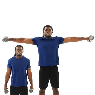 man doing TBI exercise with dumbbells